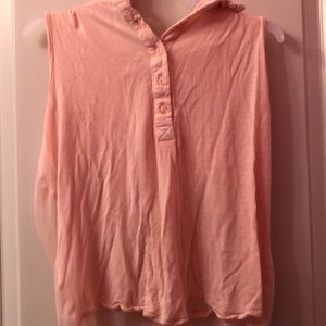 Peach colored shirt